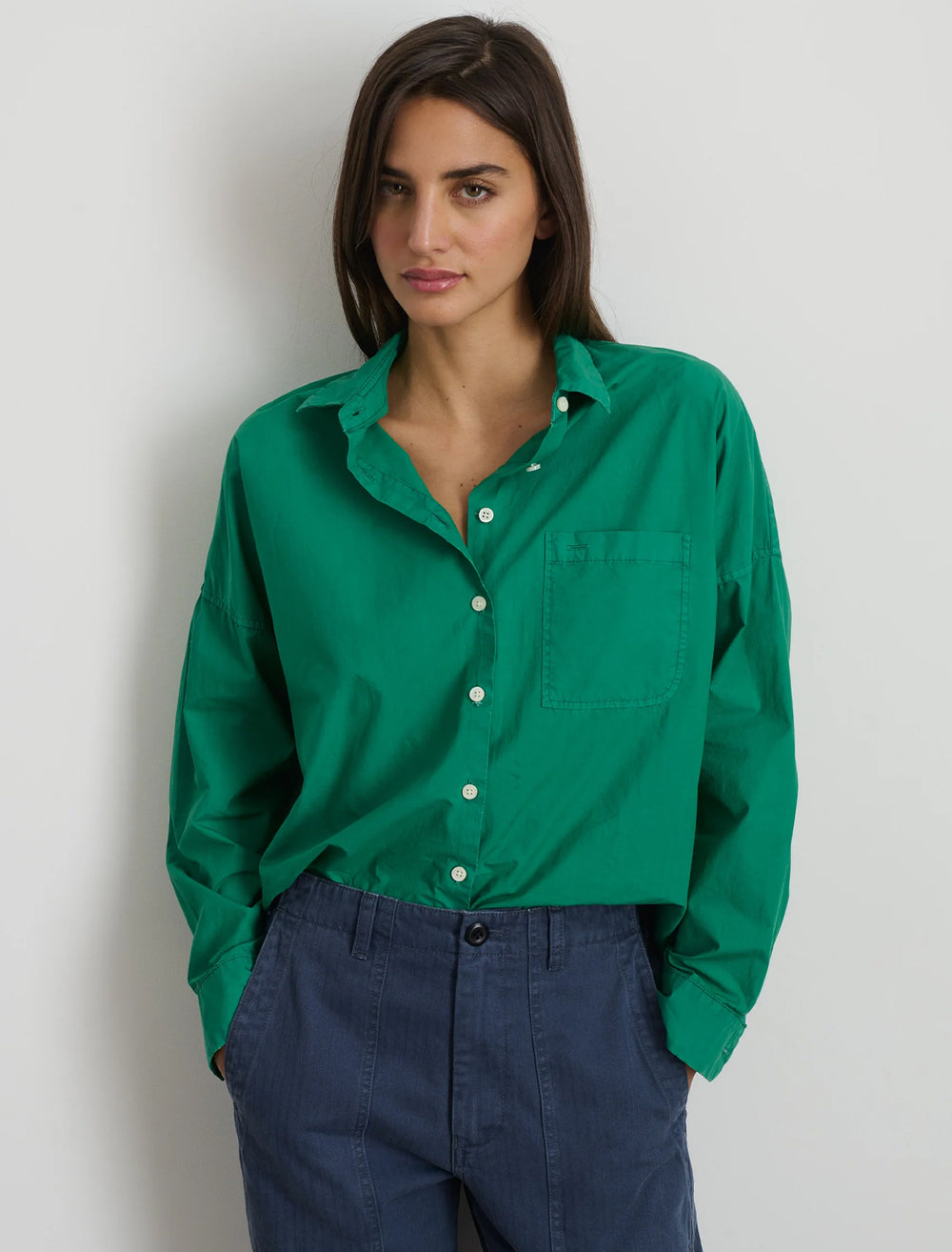 Model wearing Alex Mill's standard shirt in spring green.