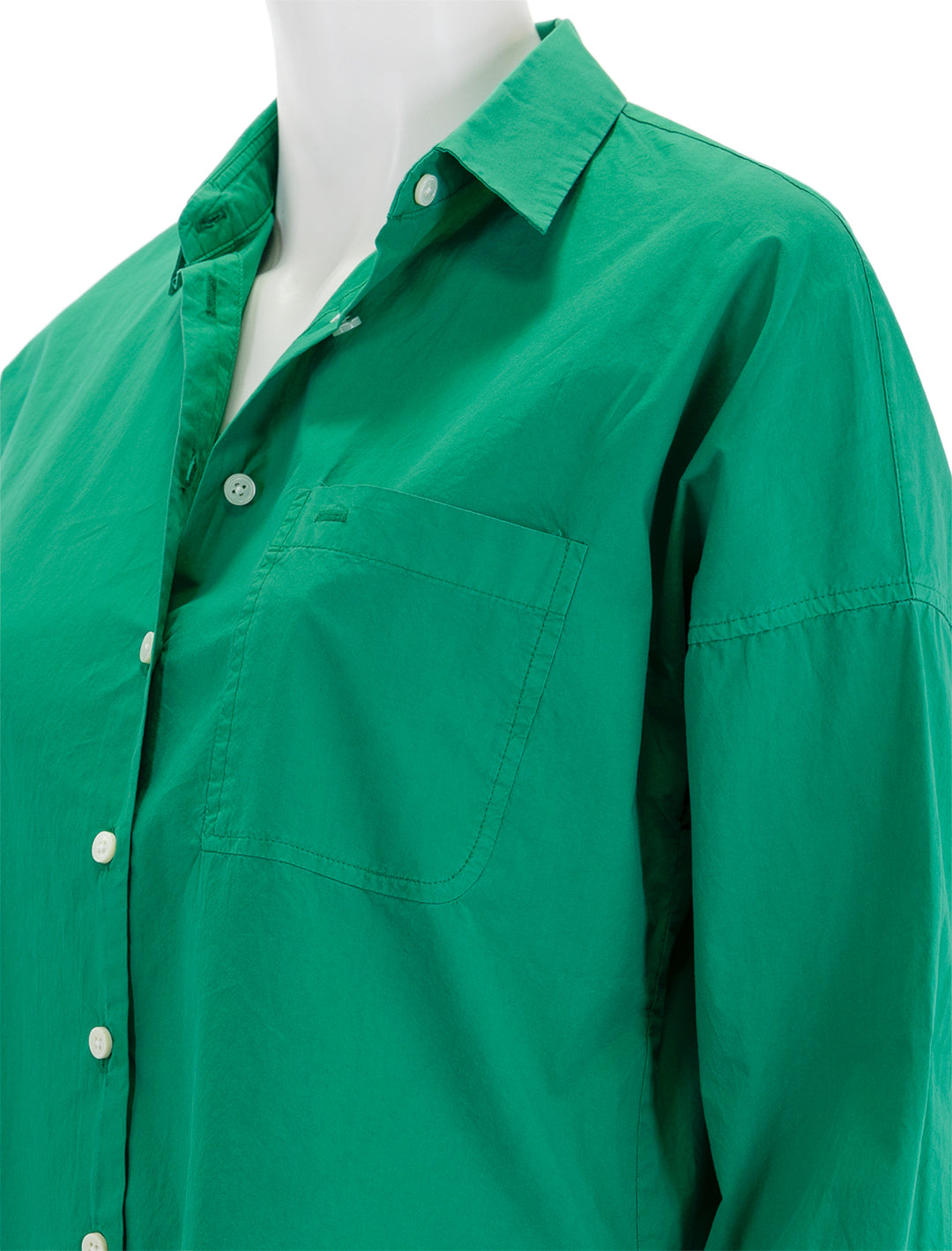 Close-up view of Alex Mill's standard shirt in spring green.