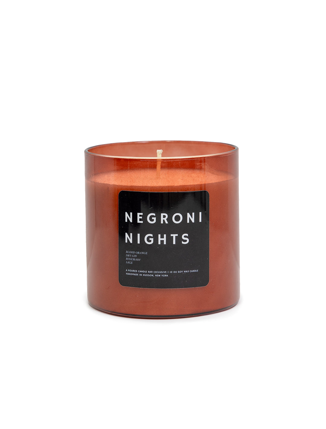 Front view of Poured Candle Bar's negroni nights candle.