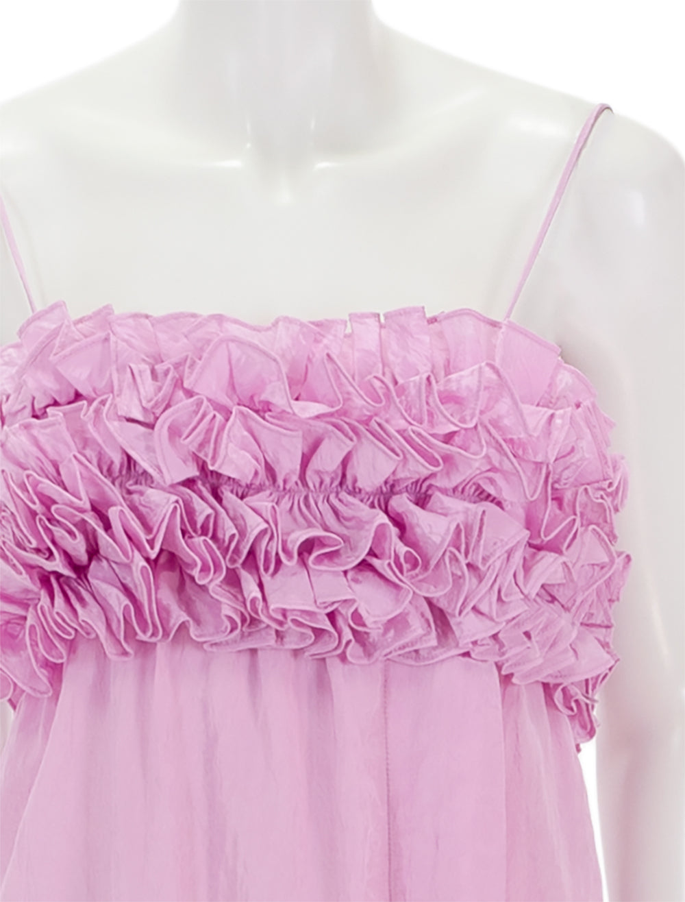 Close-up view of Ganni's shiny tech strap midi dress in lilac sachet.