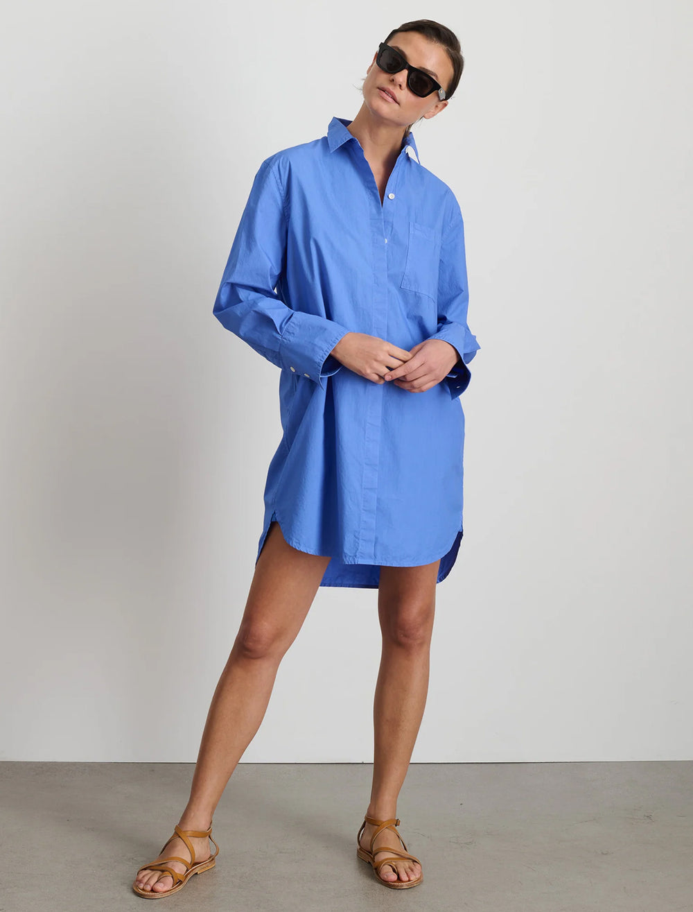 Model wearing Alex Mill's belle shirt dress in french blue paper poplin.