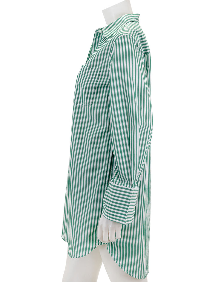 Side view of Alex Mill's belle shirt dress in green and white.