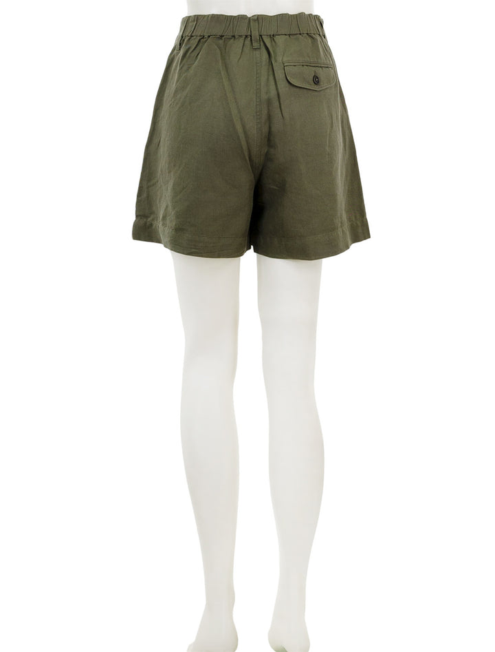 Back view of Alex Mill's pleated twill shorts in pulgia olive.