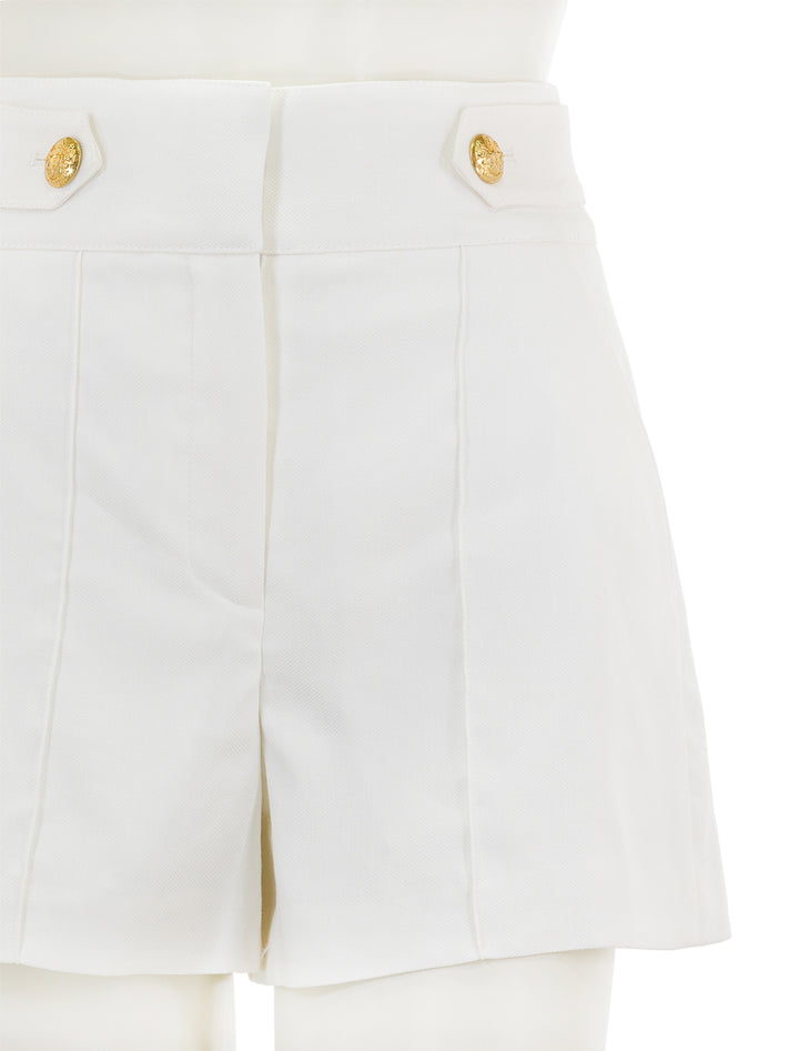 Close-up view of Veronica Beard's runo shorts in white.