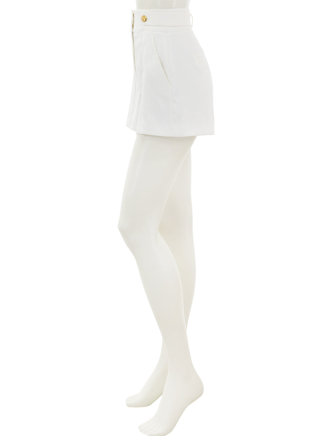 Side view of Veronica Beard's runo shorts in white.