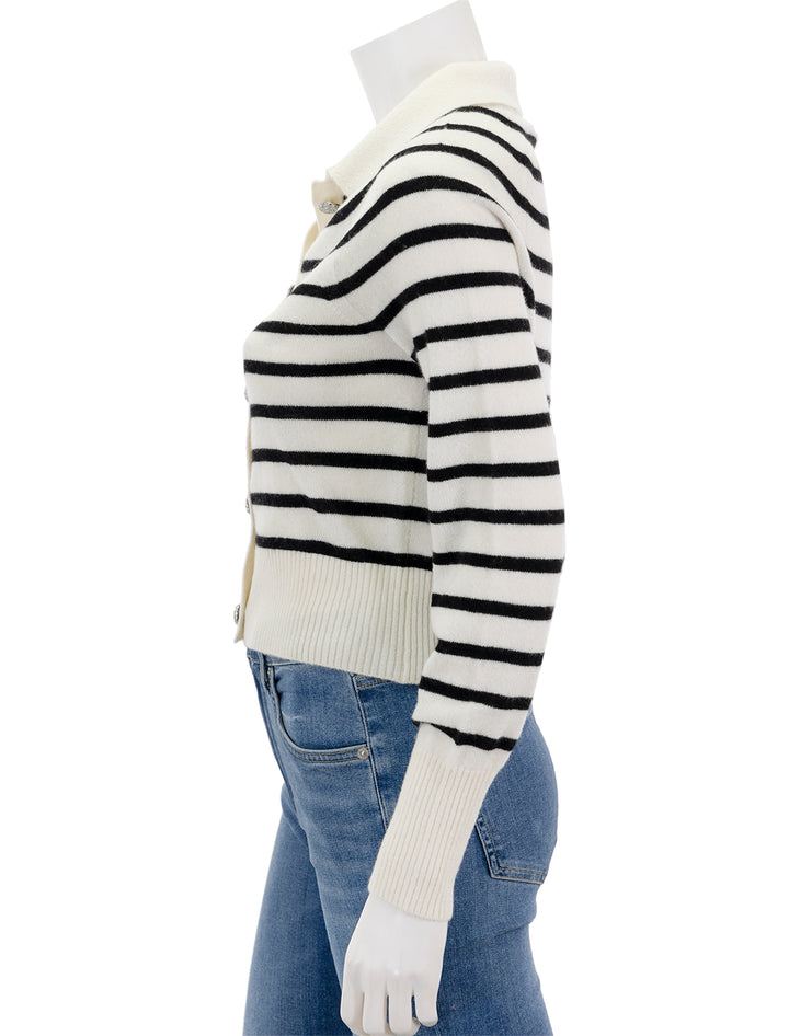 Side view of Veronica Beard's cheshire cardigan in off-white and black stripe.