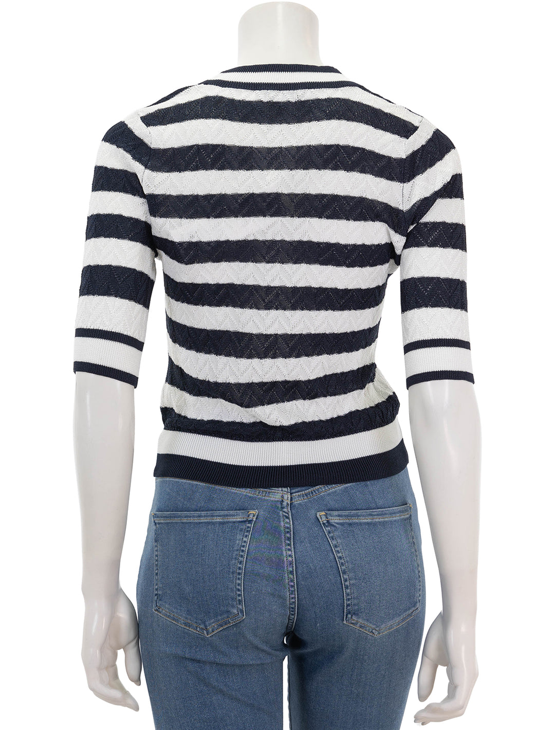 back view of lisbeth knit top in white and navy stripe