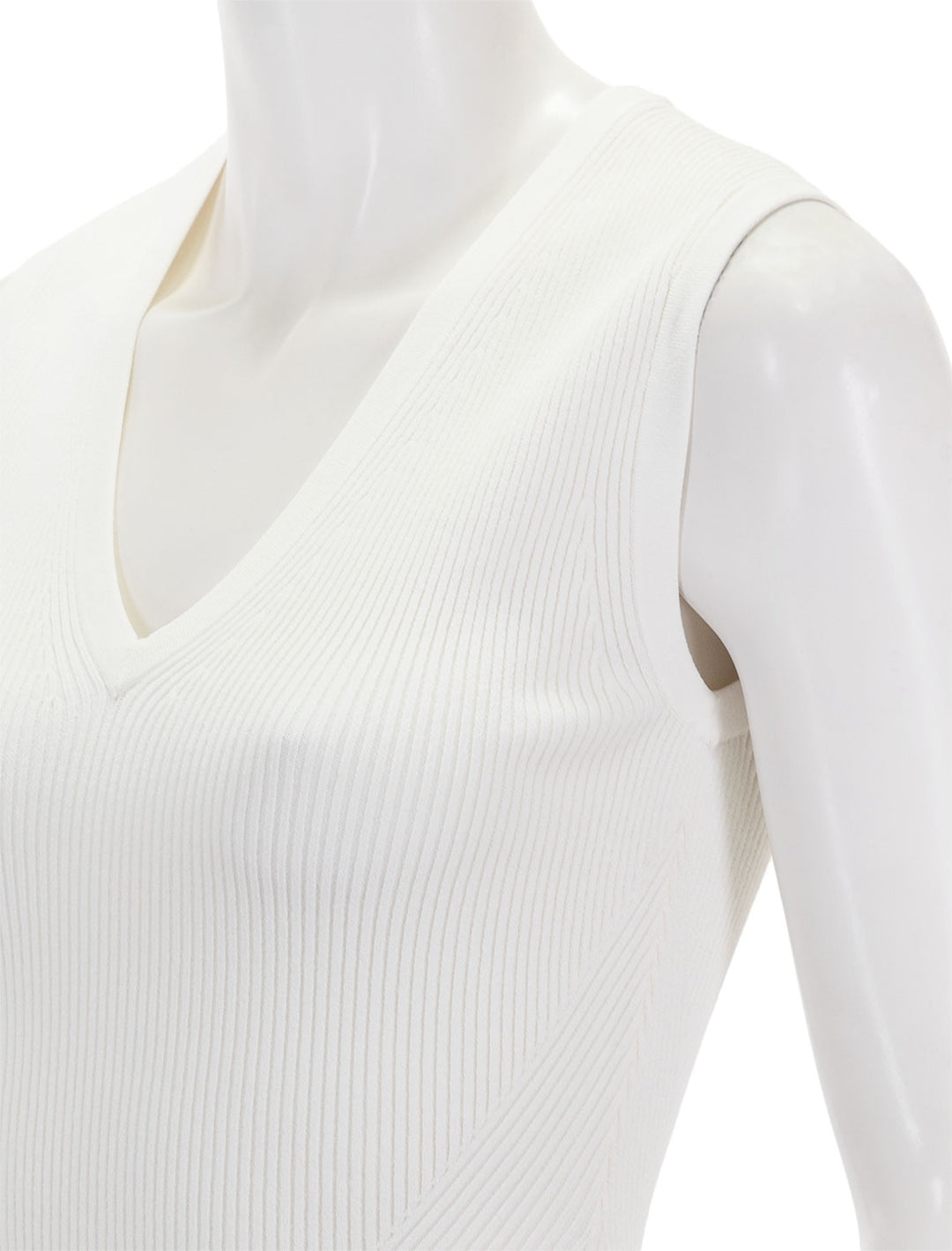 Close-up view of Veronica Beard's sid sleeveless pullover in off-white.