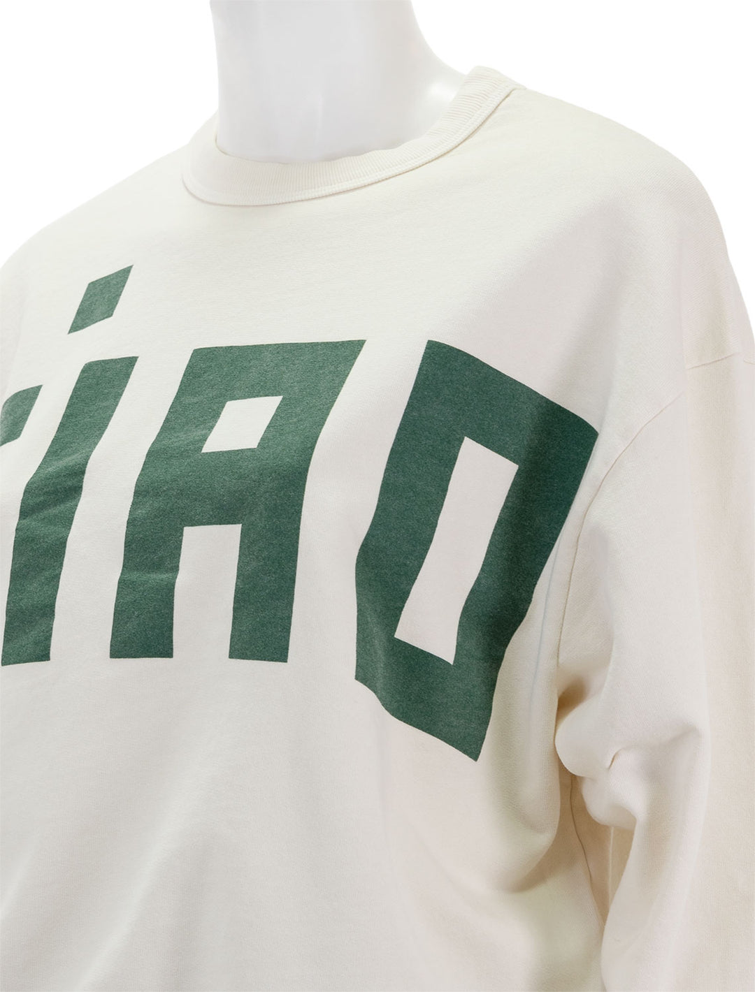 Close-up view of Clare V.'s ciao oversized sweatshirt in cream and evergreen.