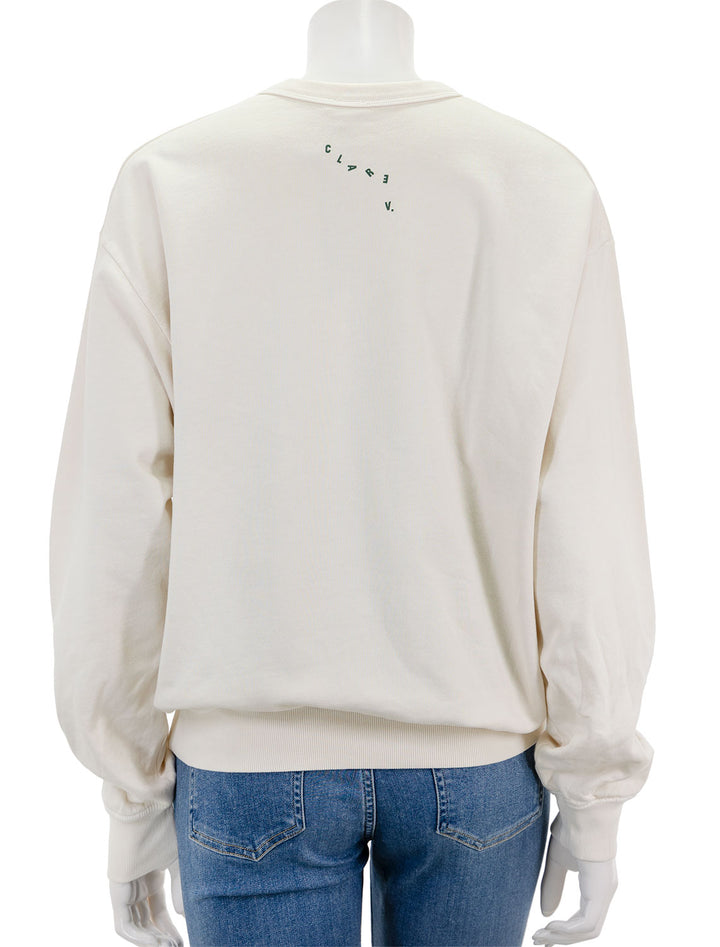 Back view of Clare V.'s ciao oversized sweatshirt in cream and evergreen.