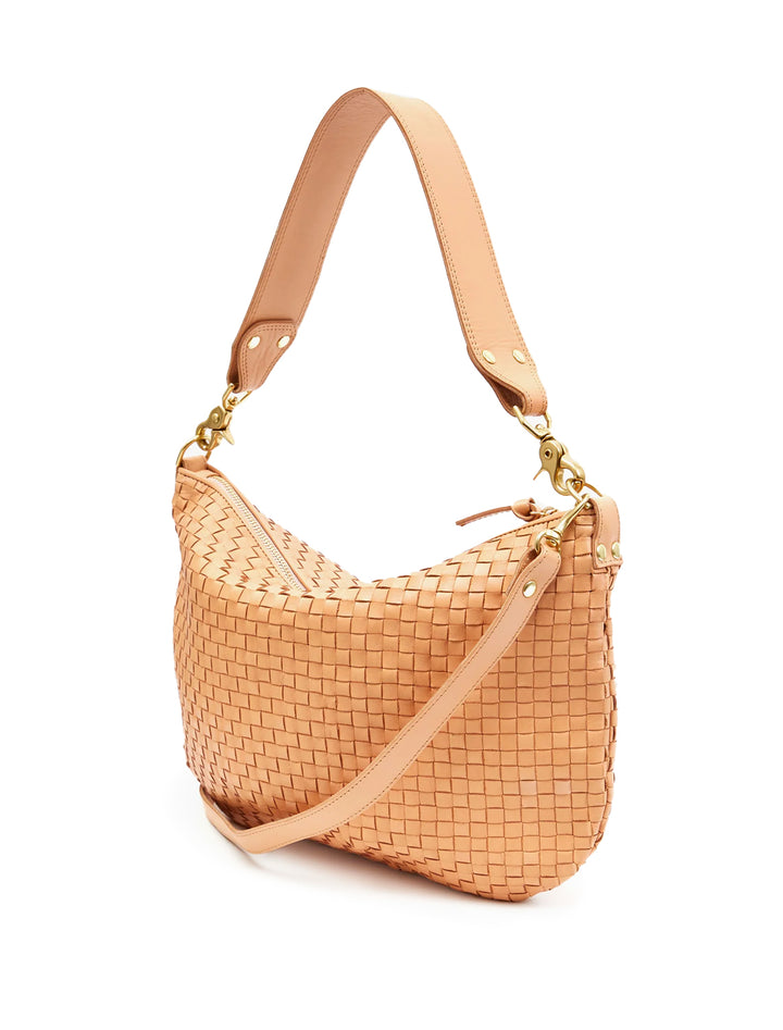 Back angle view of Clare V.'s moyen messenger in bisque woven.
