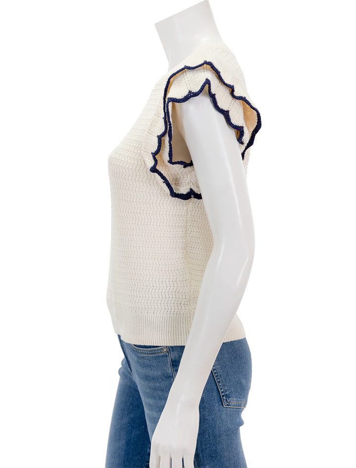 Side view of Lilla P.'s tipped sleeve crewneck sweater in ivory.