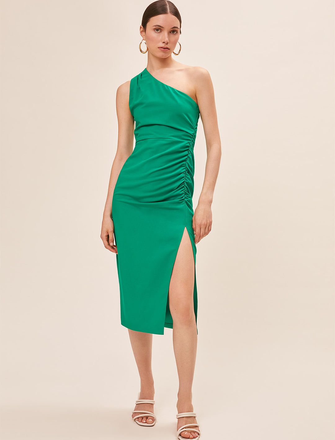 model wearing crocus one shoulder dress in vert