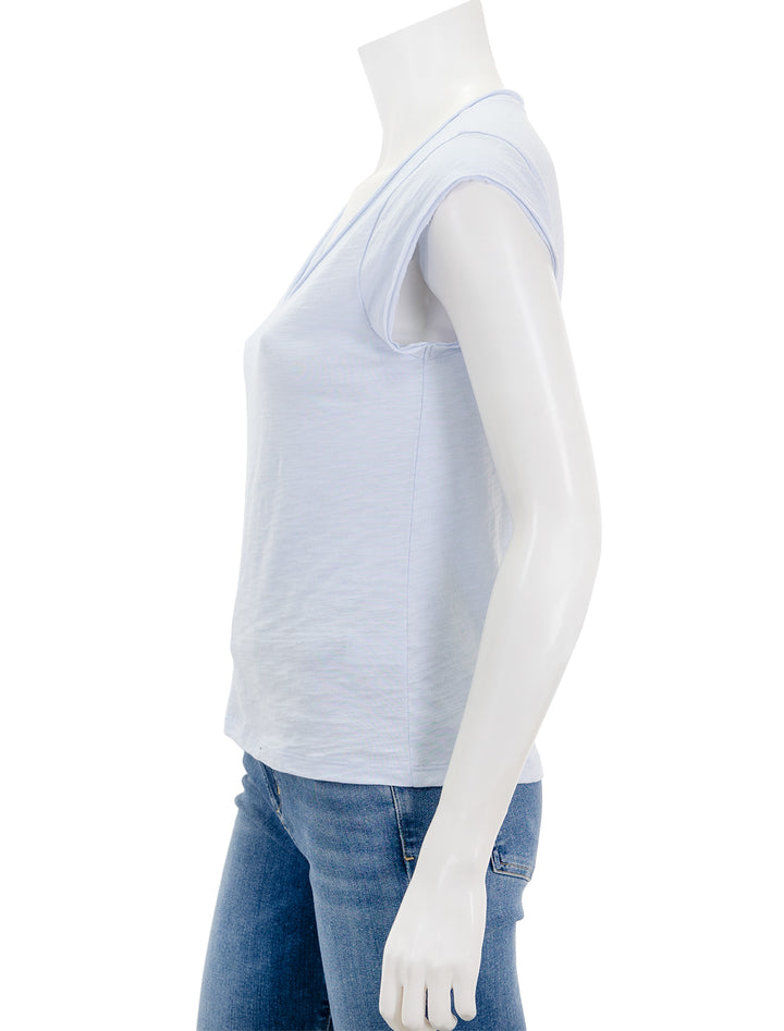 Side view of Lilla P.'s loose knit slub cap sleeve v neck tee in hyacinth.