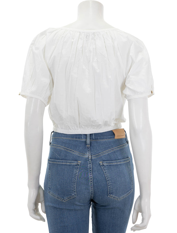 back view of elastic hem button front top in white