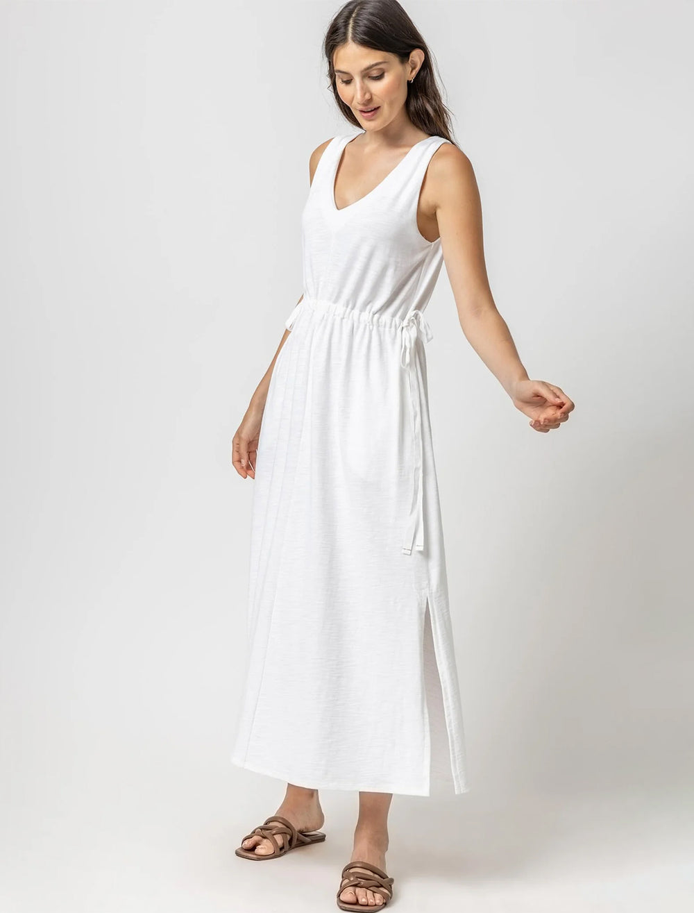 Model wearing Lilla P.'s drawcord waist maxi dress in white.