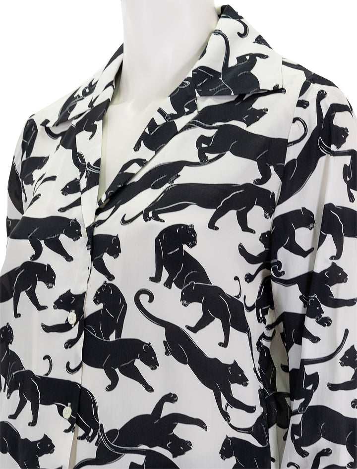 Close-up view of Anine Bing's mylah shirt in panther print.