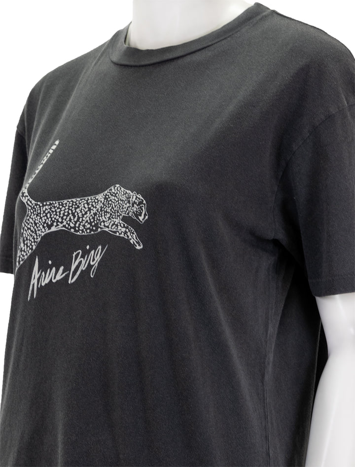 Close-up view of Anine Bing's spotted leopard walker tee in washed black.