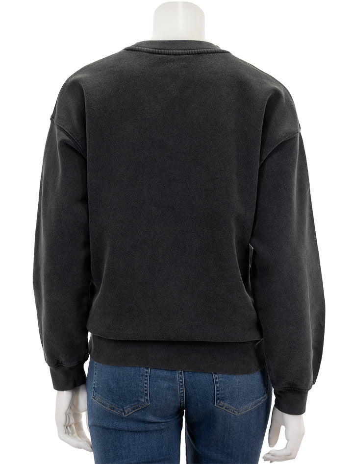 Back view of Anine Bing's spotted leopard spencer sweatshirt in washed black.