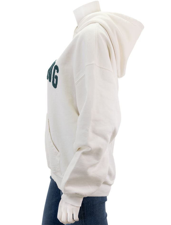 Side view of Anine Bing's harvey sweatshirt in ivory and sage.
