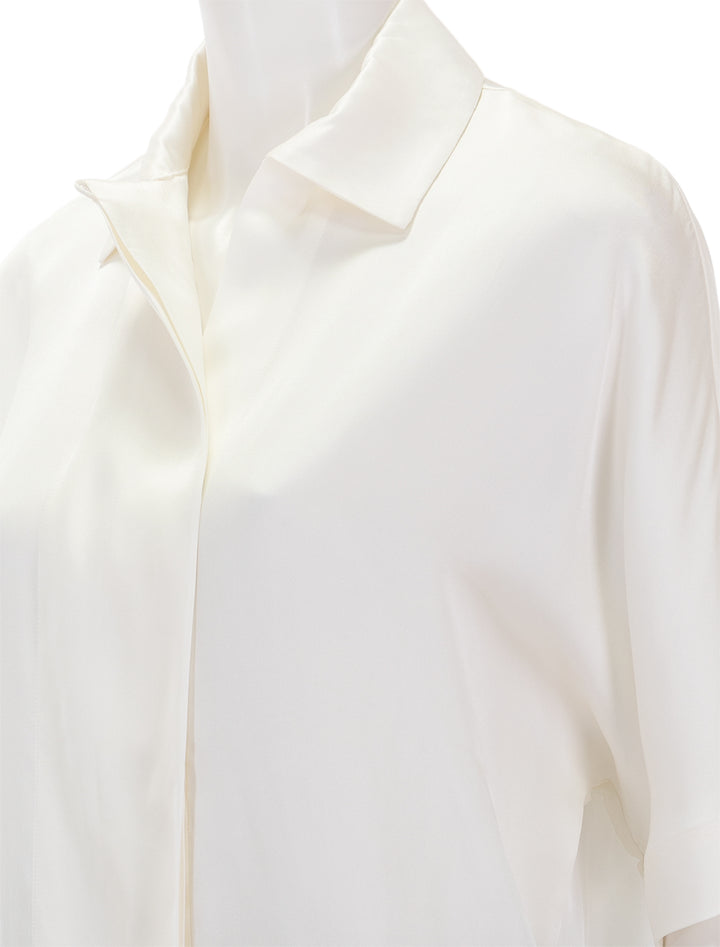 Close-up view of Anine Bing's julia blouse in ivory.