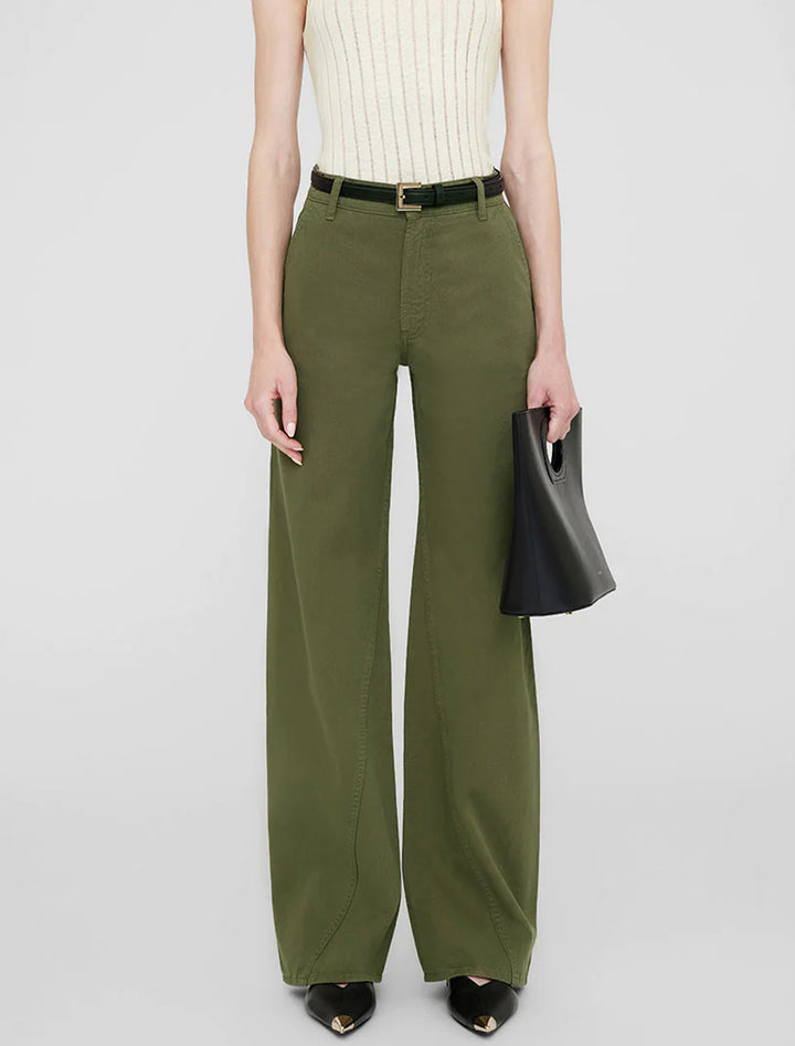 Model wearing Anine Bing's briley pant in army green.