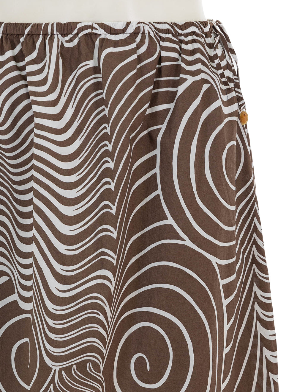 Close-up view of Rails' beech skirt in swirls.