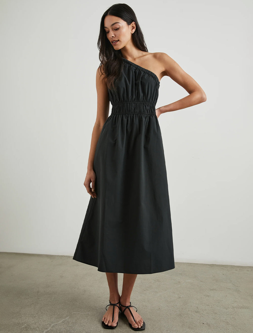 Model wearing Rails' selani dress in black.