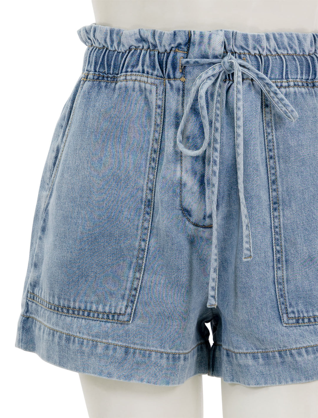 Close-up view of Rails' foster shorts in faded indigo chambray.