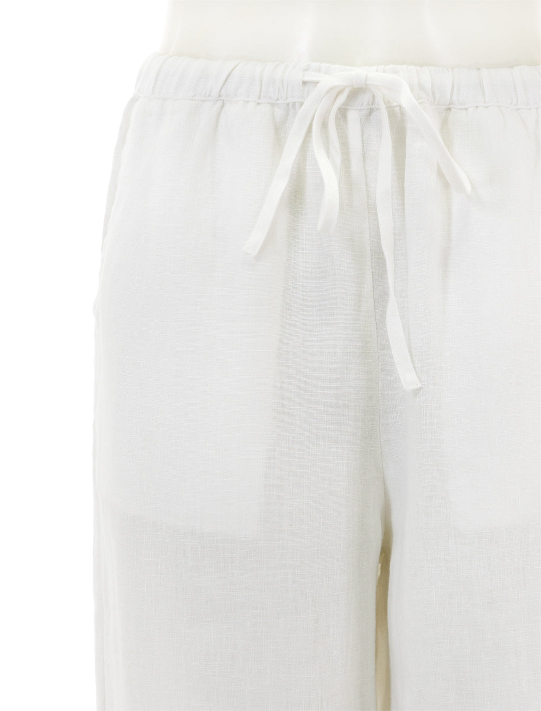 Close-up view of Rails' emmie linen pants in white.