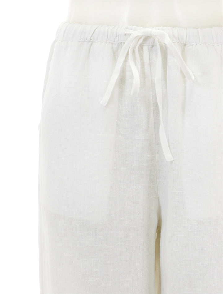 Close-up view of Rails' emmie linen pants in white.