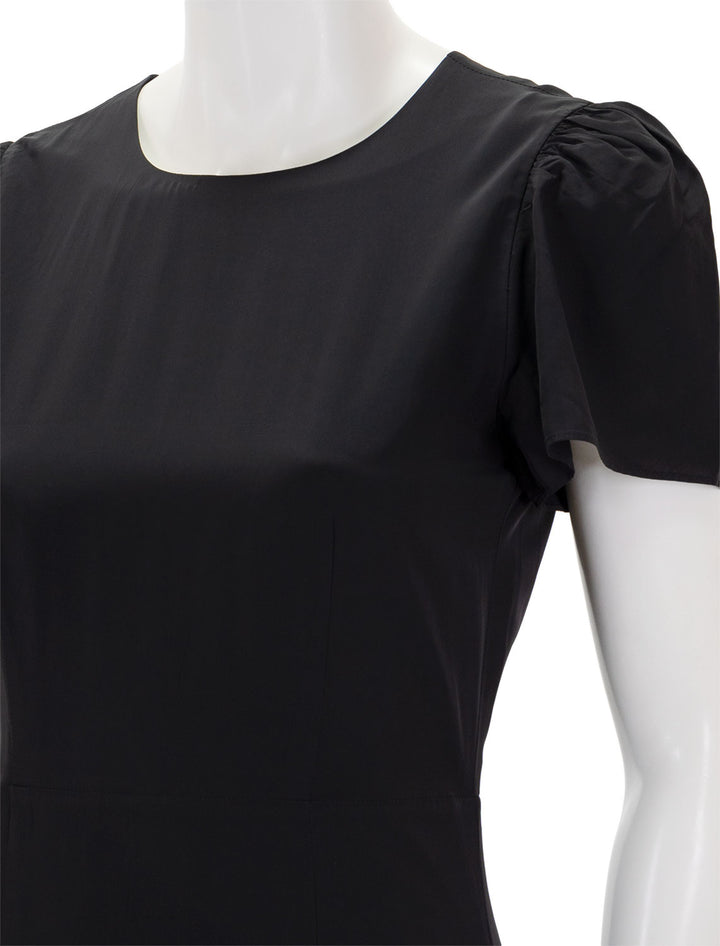 Close-up view of Rhode's lulani dress in black.