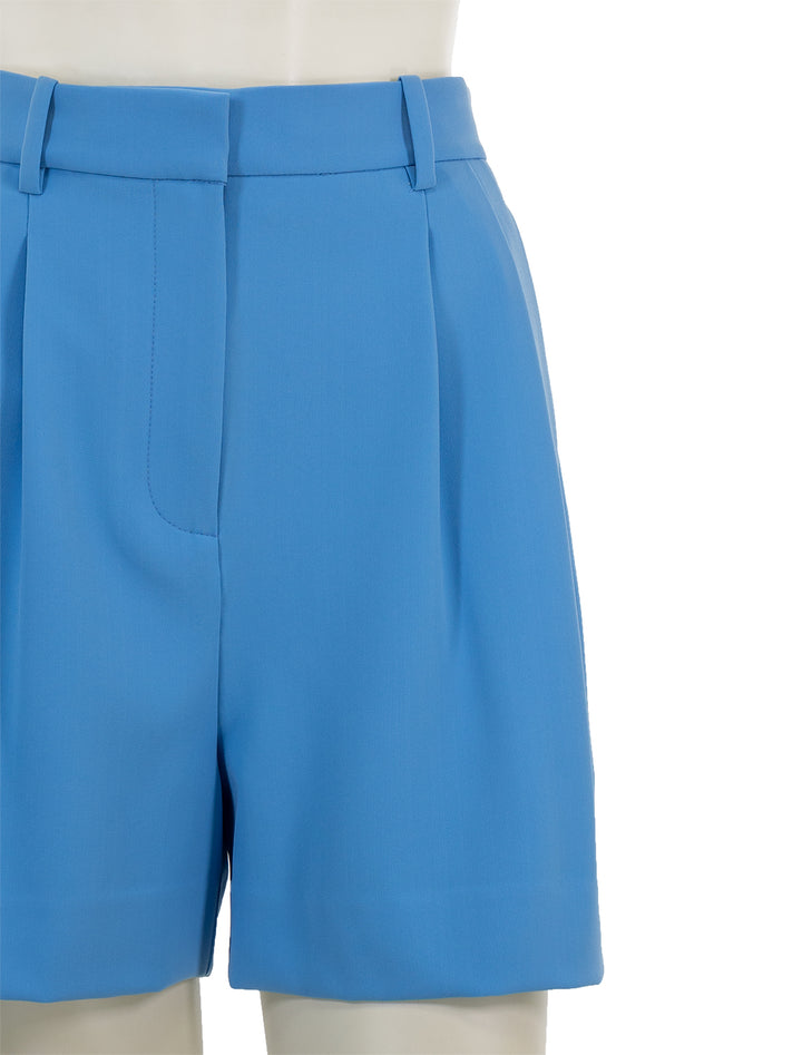 Close-up view of Derek Lam 10 Crosby's talulah shorts in azure.