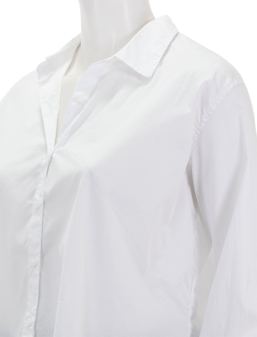 Close-up view of Splendid's cropped poplin button down in white.