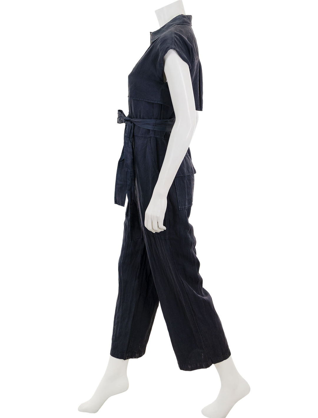 Side view of Saint Art's maxine short sleeve cargo jumpsuit in licorice.