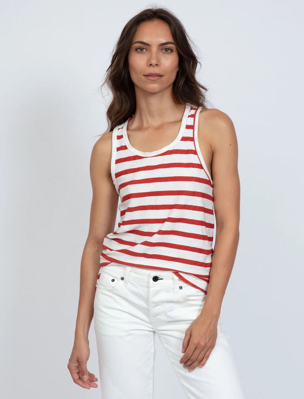Model wearing ASKK NY's printed tank in red and white stripe.