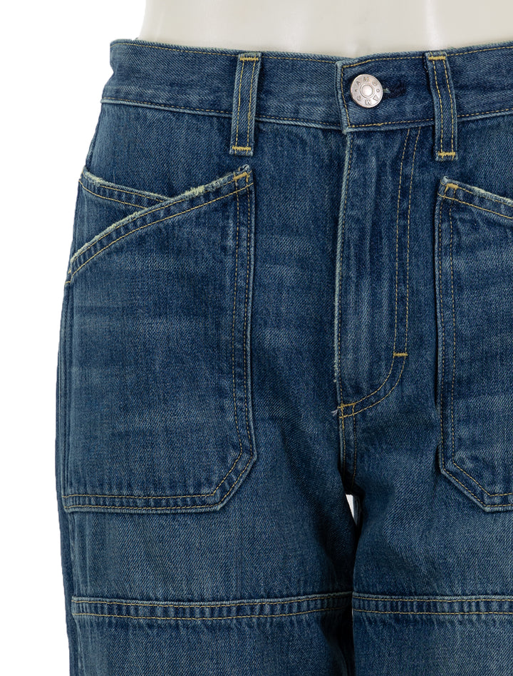 Close-up view of AMO's Doris Utility Jean in Tease.