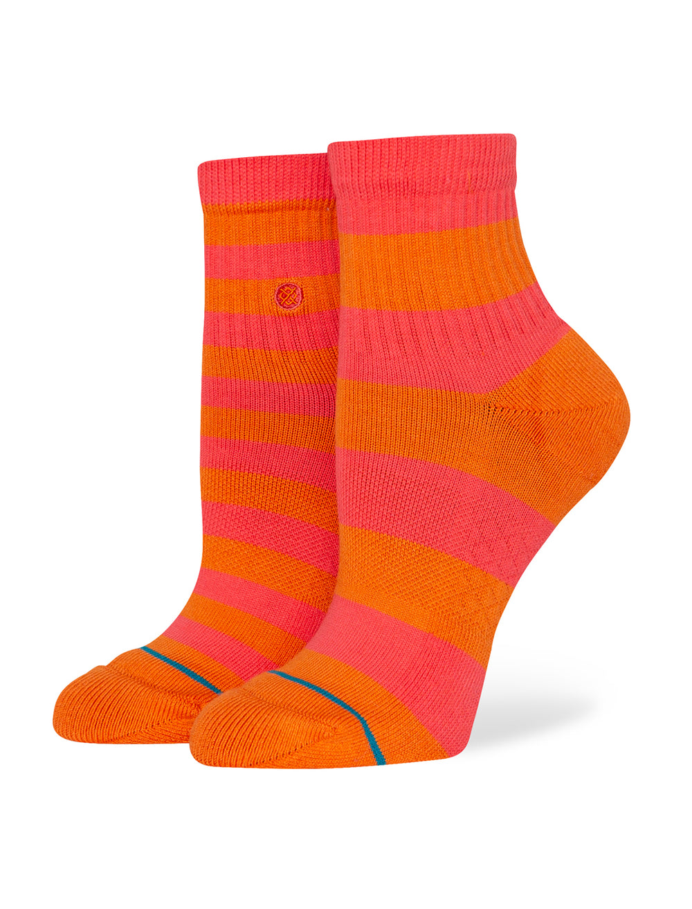 Stance's cotton quarter socks in balancing act orange on a foot form.