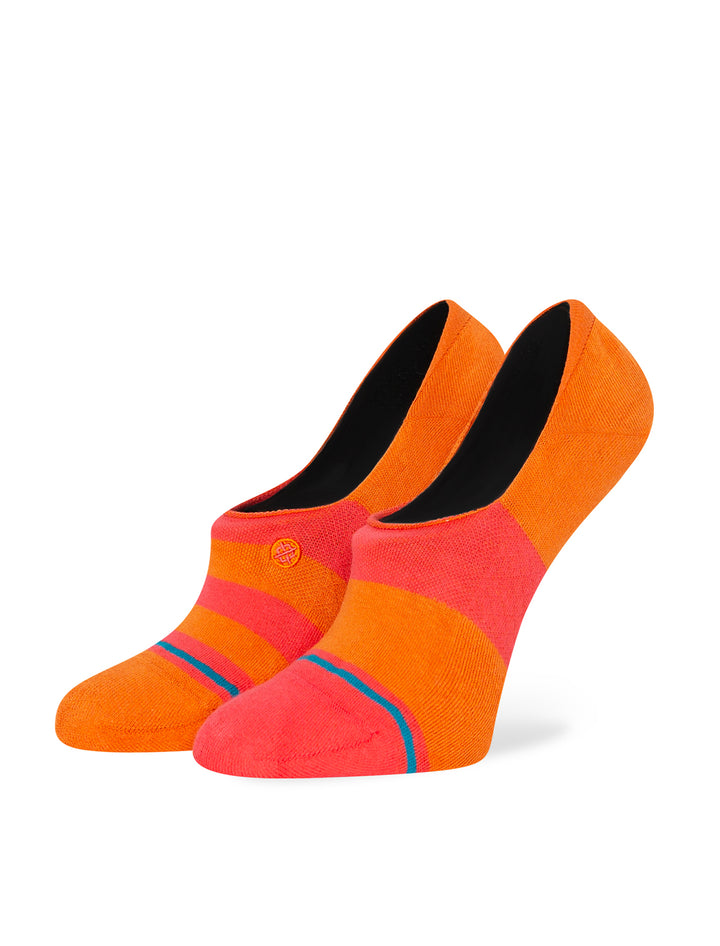 Stance's cotton no show socks in balancing act orange on a foot form.