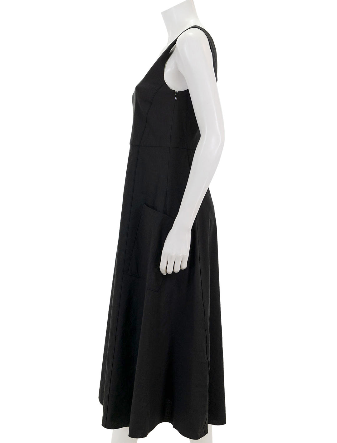 Side view of Vince's relaxed v neck pocketed dress in black.