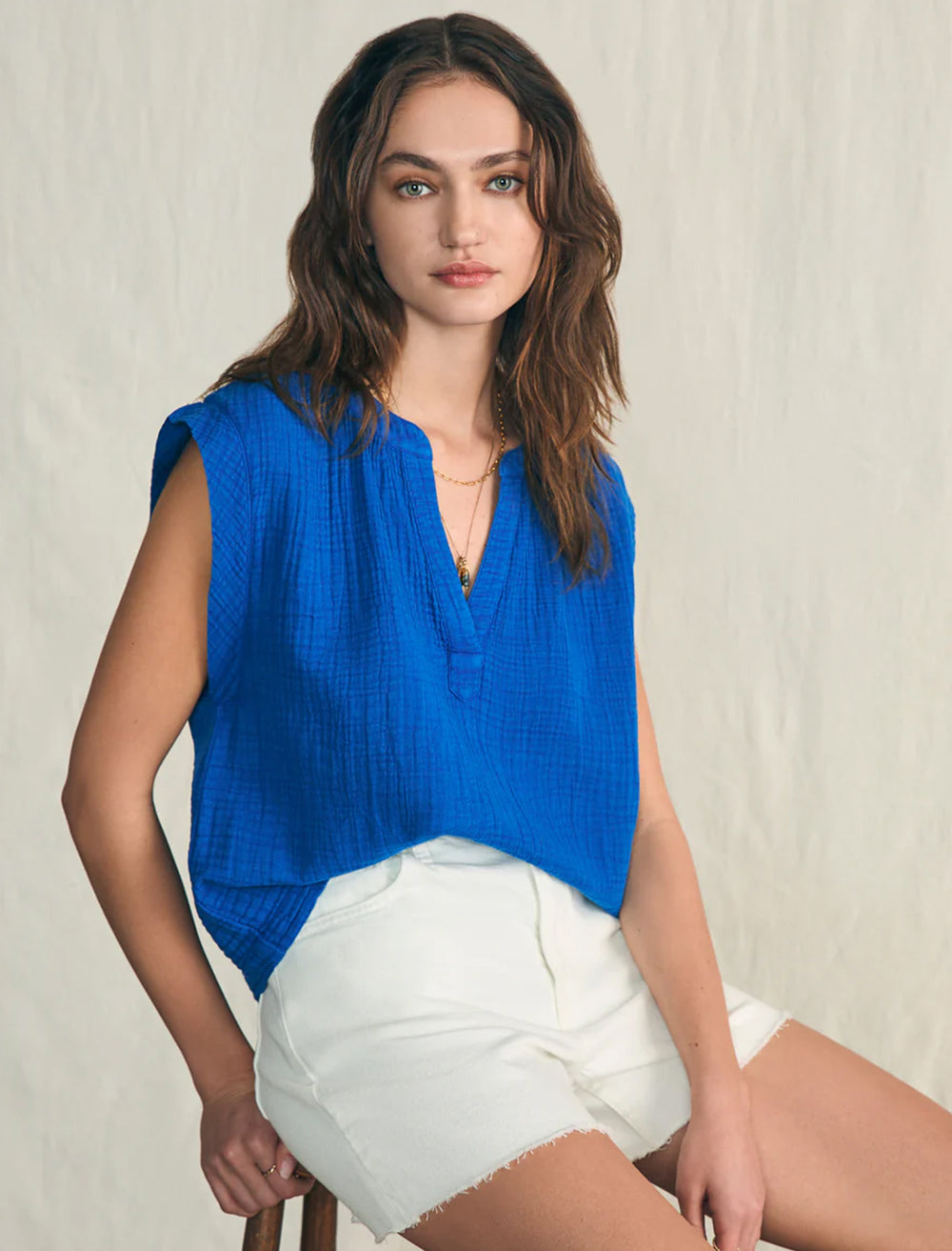 Model wearing Faherty's dylan top in strong blue.