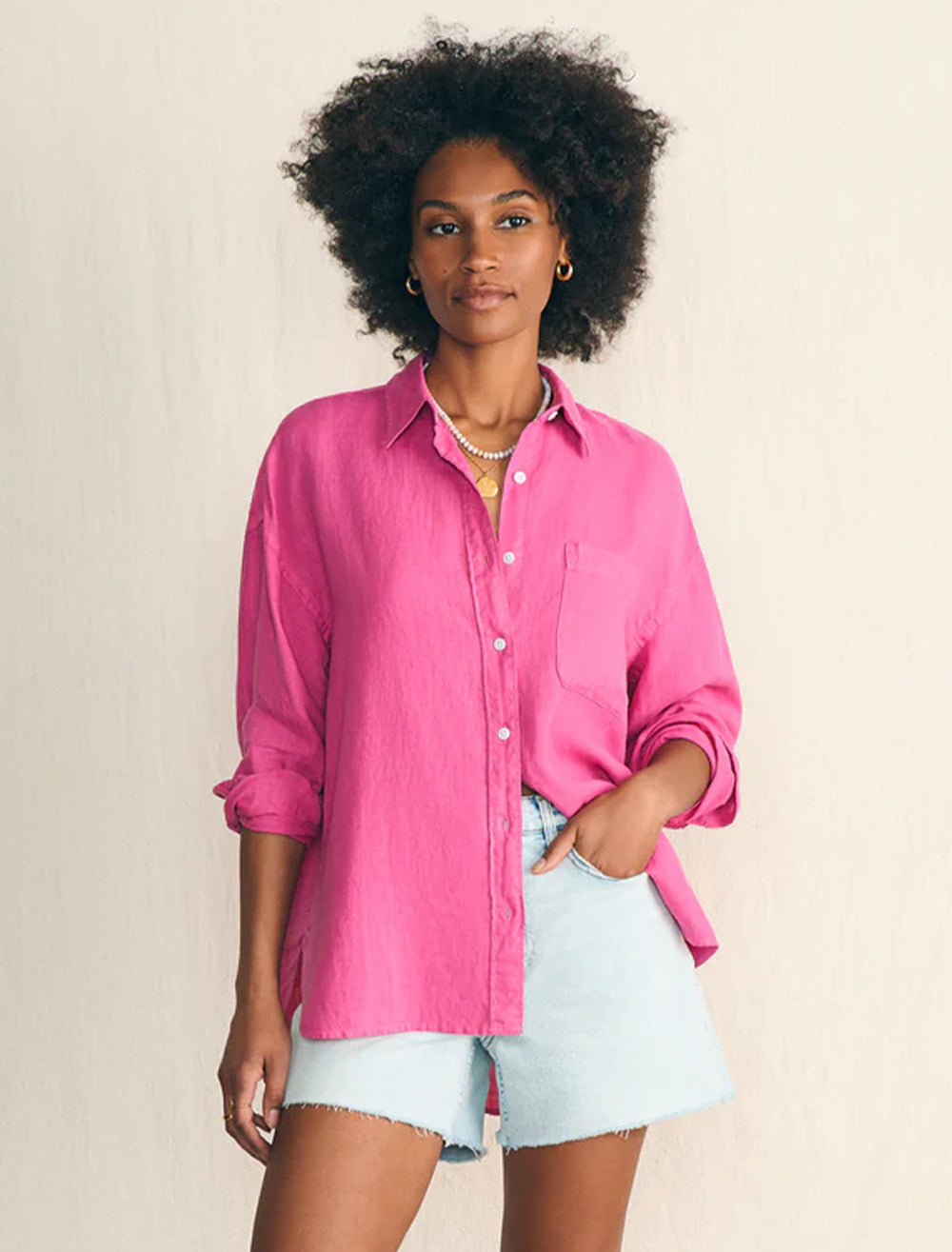 Model wearing Faherty's laguna linen relaxed shirt in cone flower.