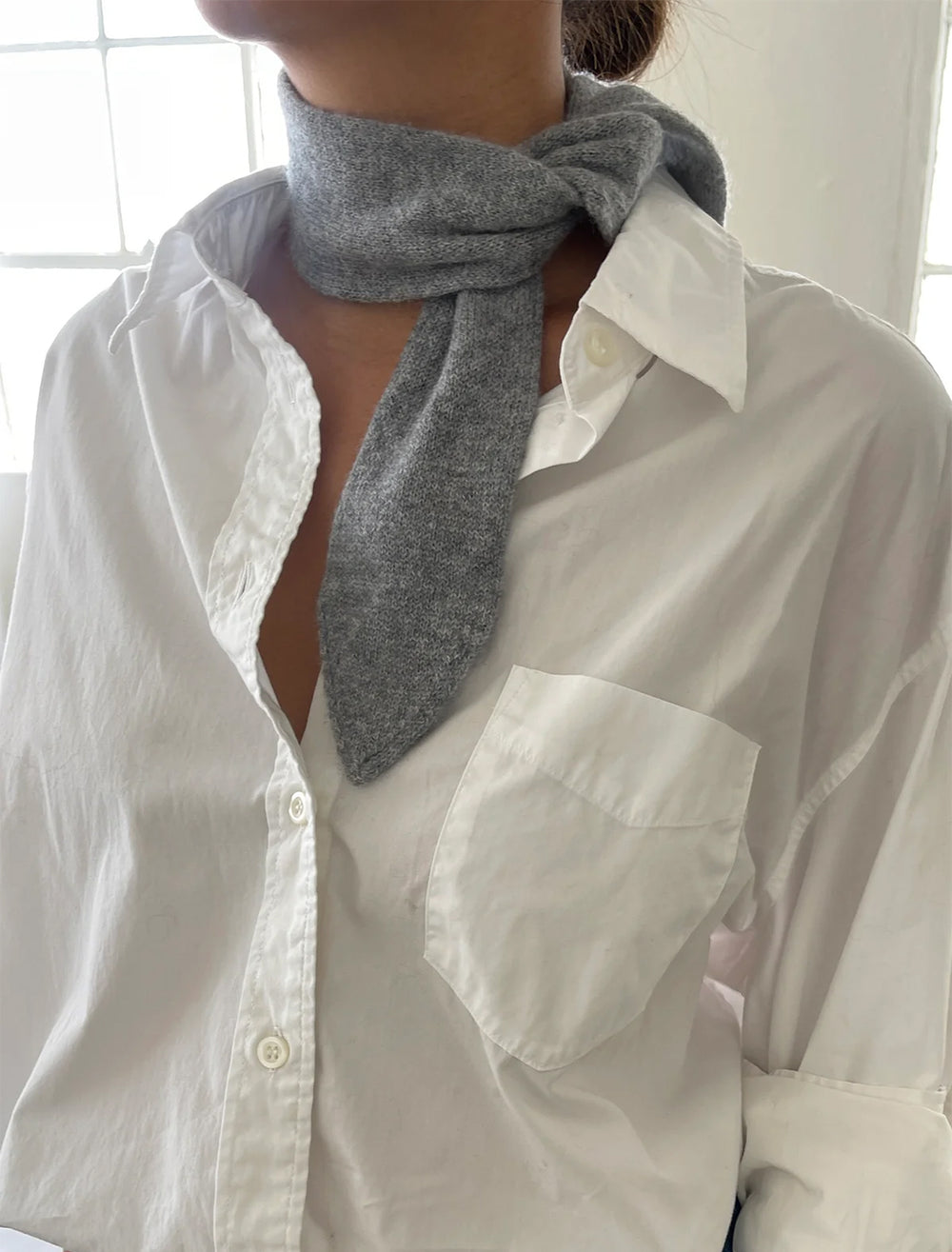 Model wearing Le Bon Shoppe's classic cashmere skinny scarf in grey.