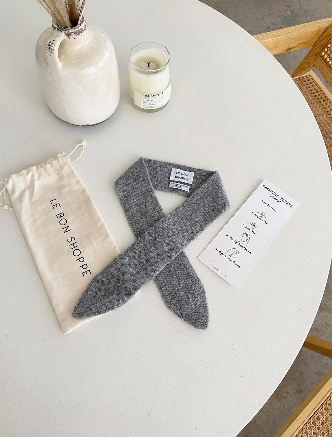 Flat lay of Le Bon Shoppe's classic cashmere skinny scarf in grey.