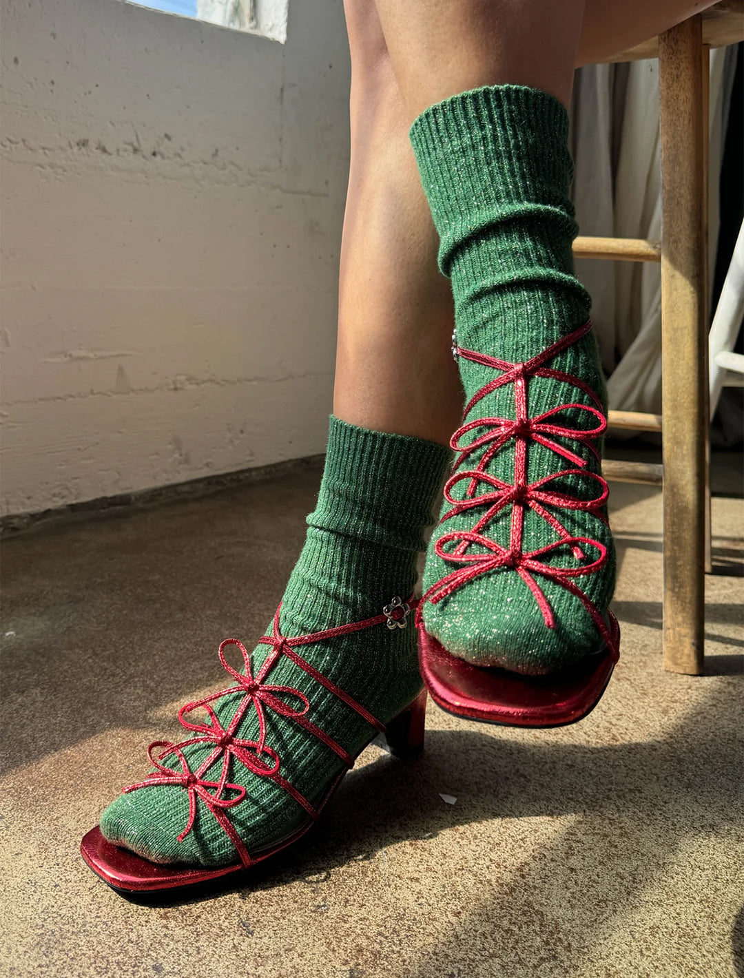 model wearing witner sparkle socks in evergreen