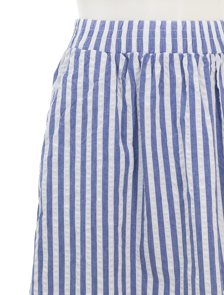 Close-up view of Stateside's puckered stripe double slit maxi skirt in navy stripe.