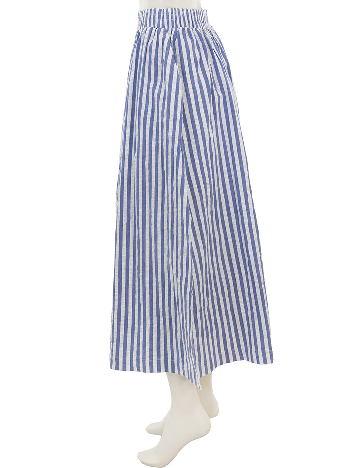 Side view of Stateside's puckered stripe double slit maxi skirt in navy stripe.