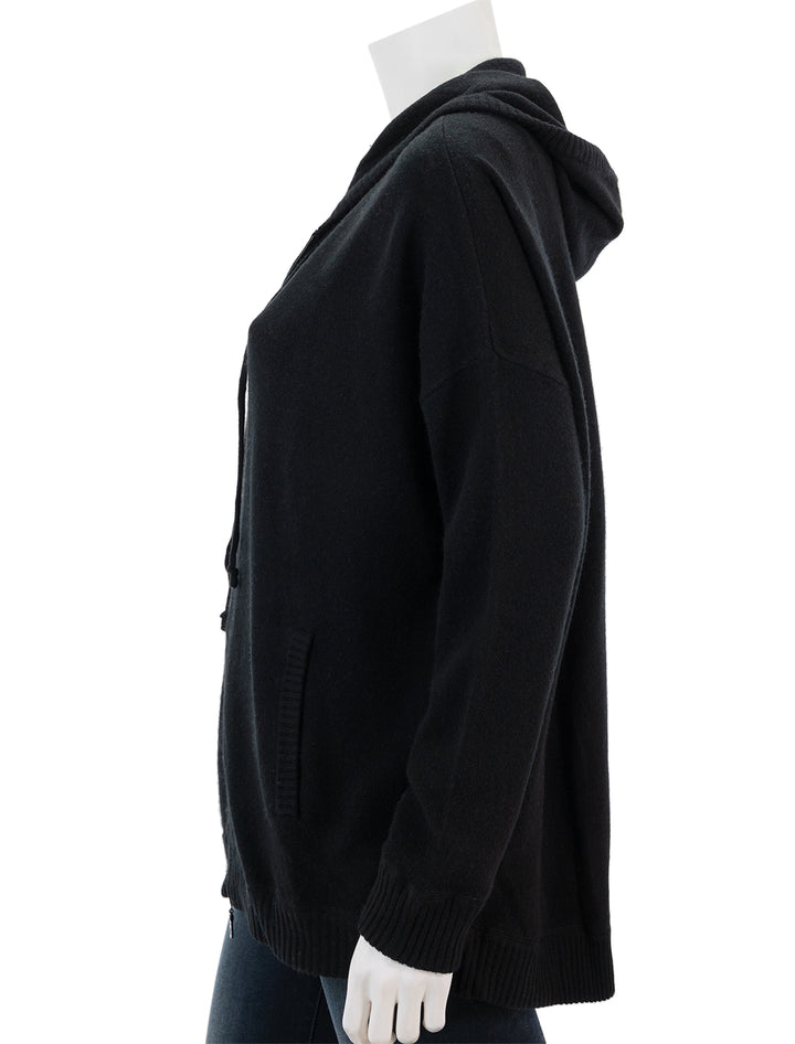 Side view of Minnie Rose's cashmere oversize zip hoodie in black.