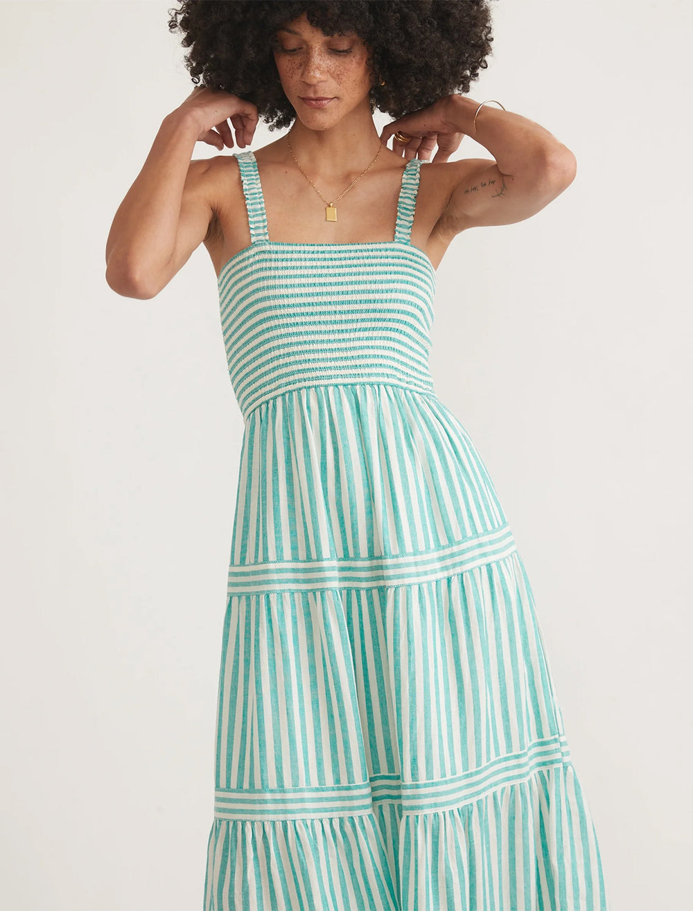 Model wearing Marine Layer's selene maxi dress in slushy stripe.