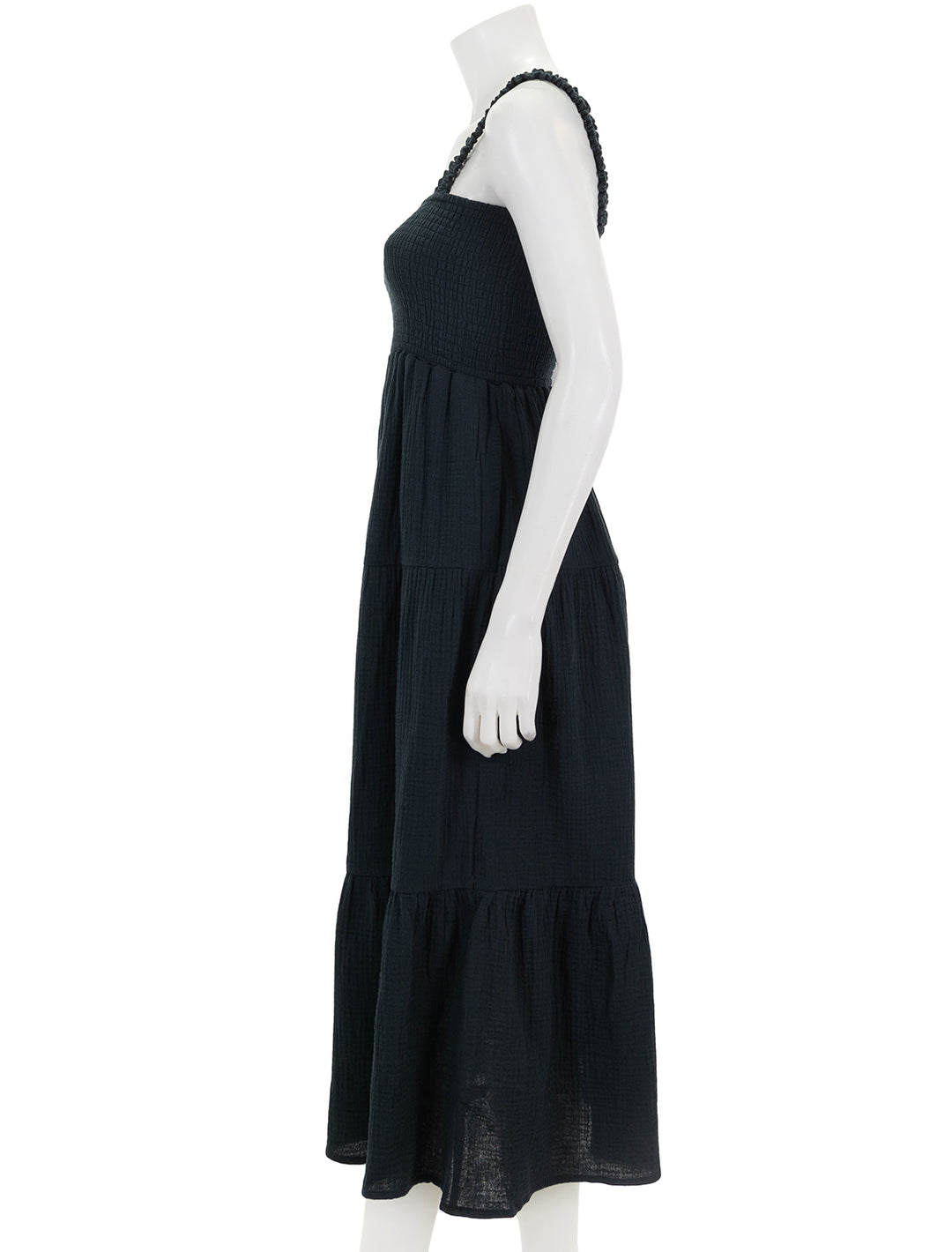 Side view of Marine Layer's selene maxi dress in black.